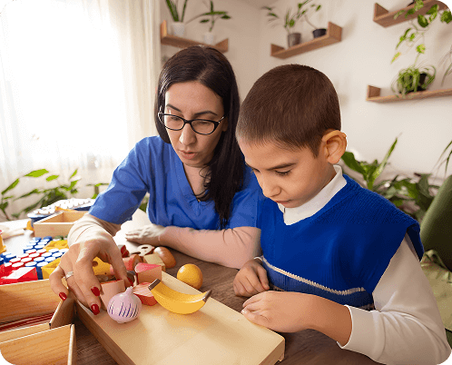 Child and therapist working together